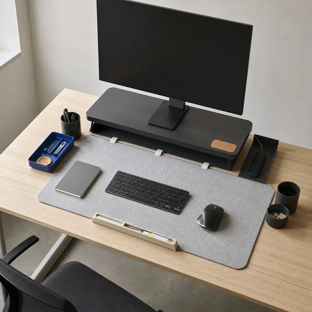 Complete Fieldlay desk setup with mat, cable route, tool tray, monitor riser, and reference ledge